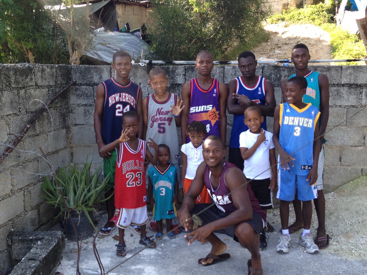 Founder Ray Abellard in 2014 with some of the first sponsored students in the program. 