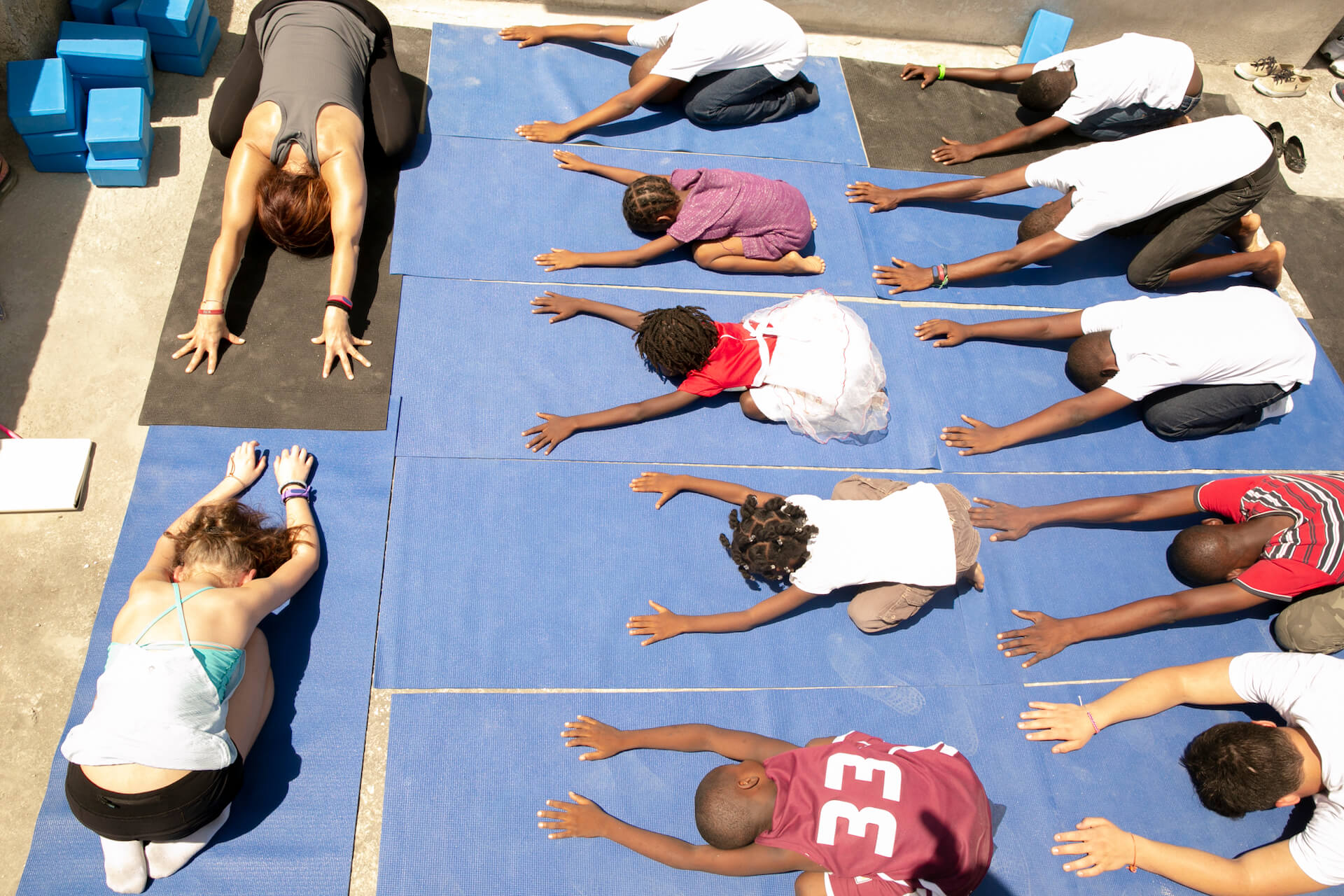 Jen Goodman, a licensed yoga instructor, taught yoga and stretching classes for the children to help them understand the importance of self care.